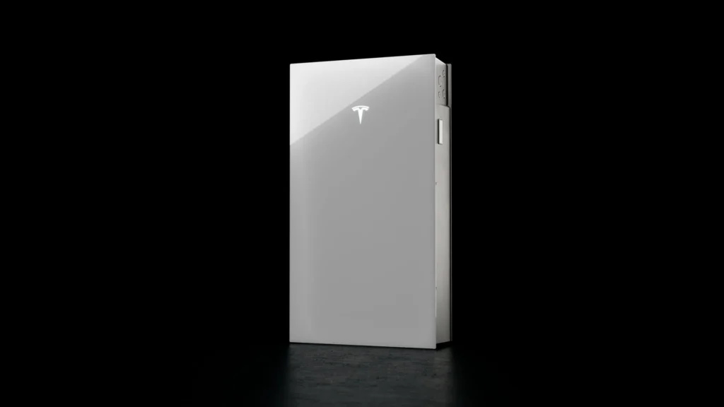 A sleek, rectangular white Tesla battery pack with a reflective surface and Tesla logo, set against a black background—an example of innovative Tesla Energy Solutions.
